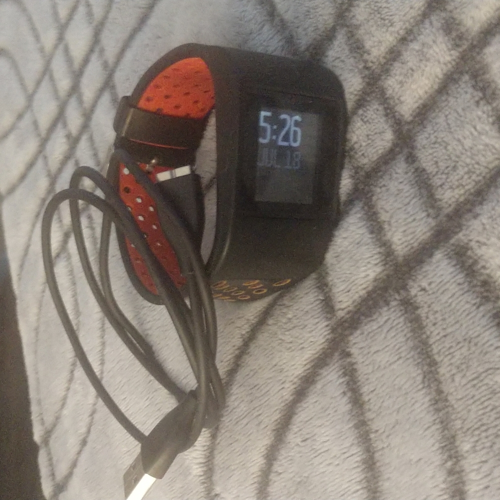 Fitbit surge black and red